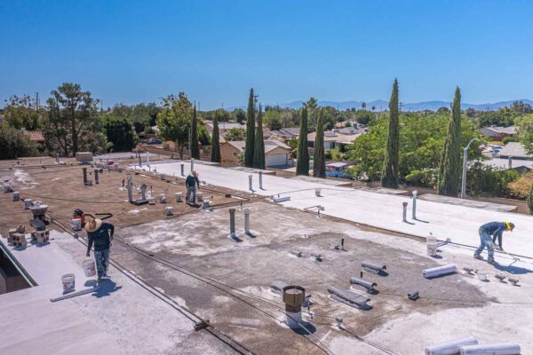 Avant Roofing-44221 Kingtree – Avant Roofing – Acrylic Coating on a Flat Gravel Roof